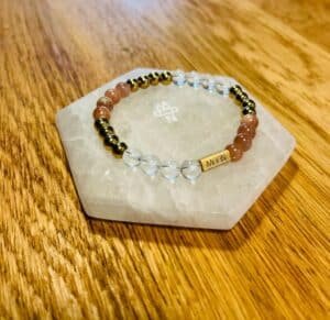 Opladen armband op Seleniet schijf