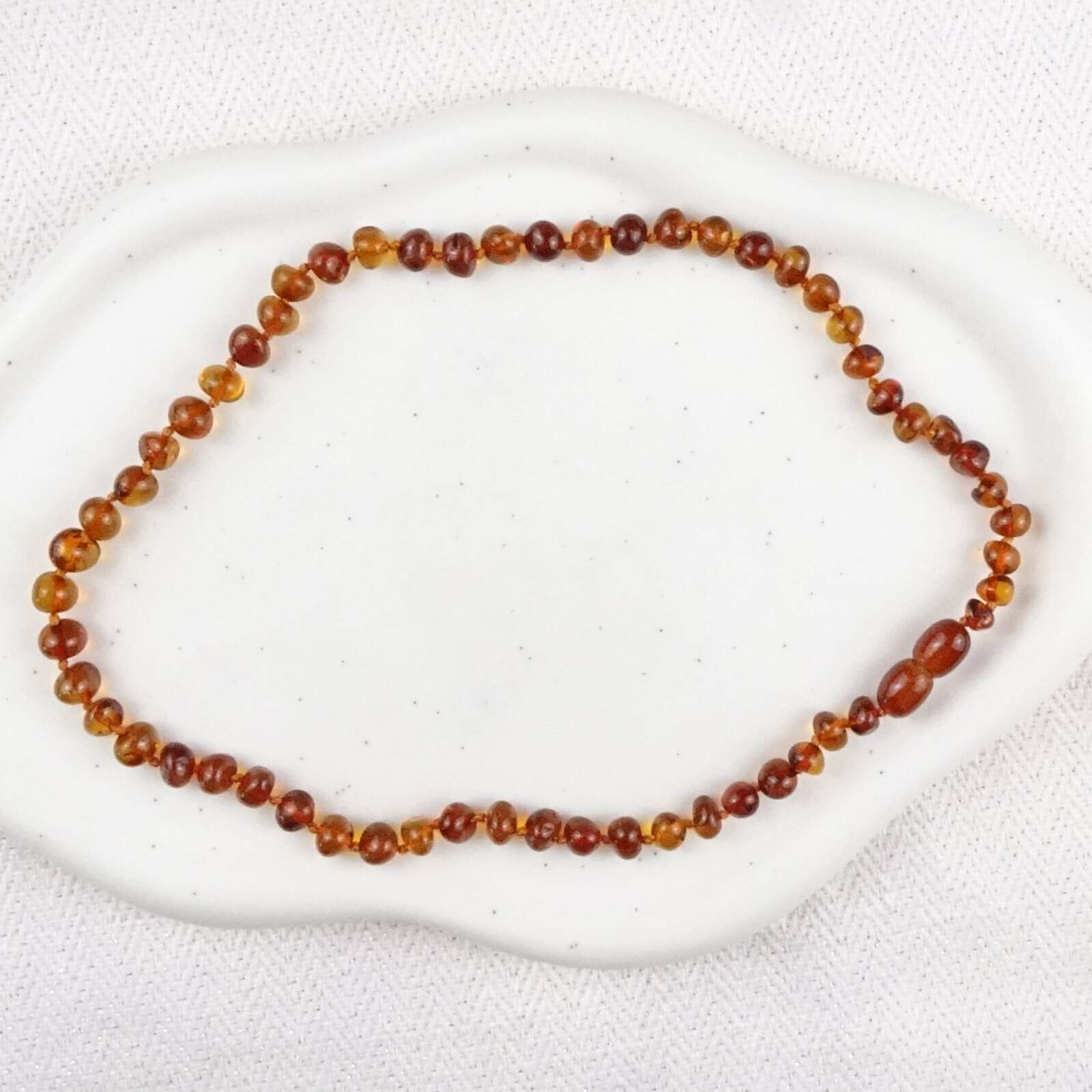 Barnsteen cognactint ketting kind